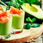 Appetizer with smoked salmon and avocado mousse, served in glasses