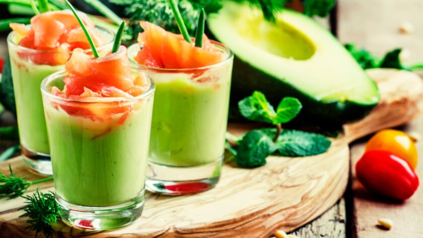 Appetizer with smoked salmon and avocado mousse, served in glasses