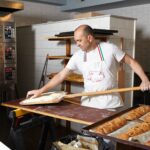 Baker working in bakery