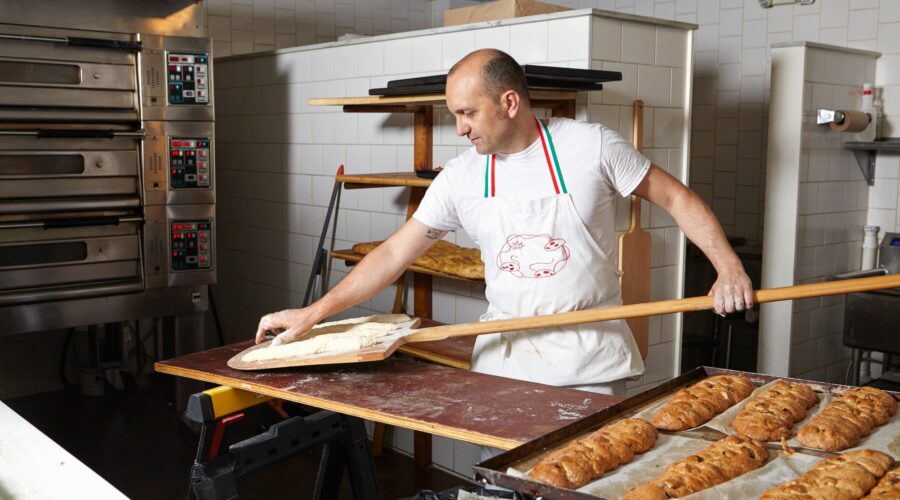 Baker working in bakery
