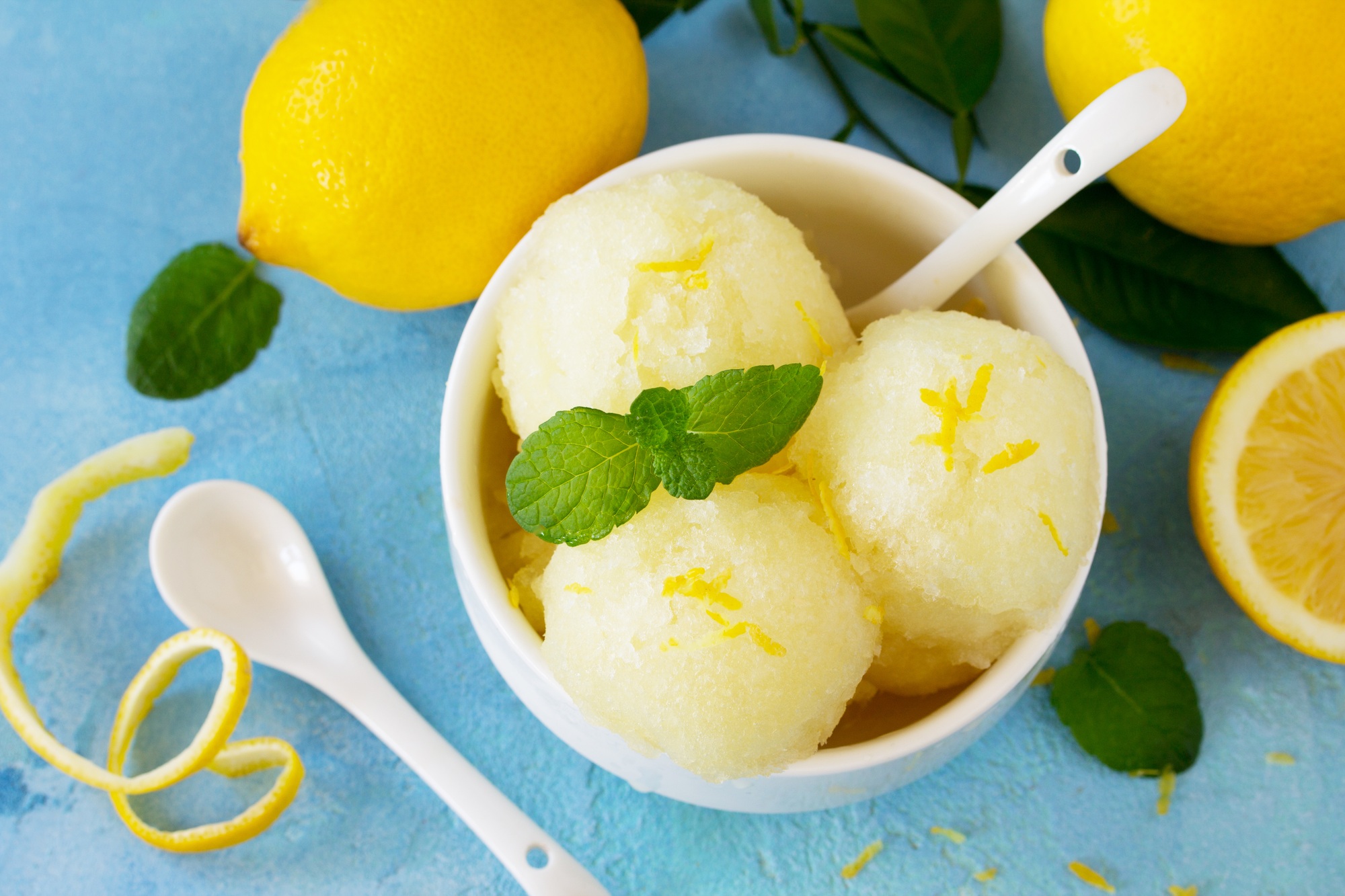 Homemade Fresh fruit lemon sorbet ice cream in a white bowl.