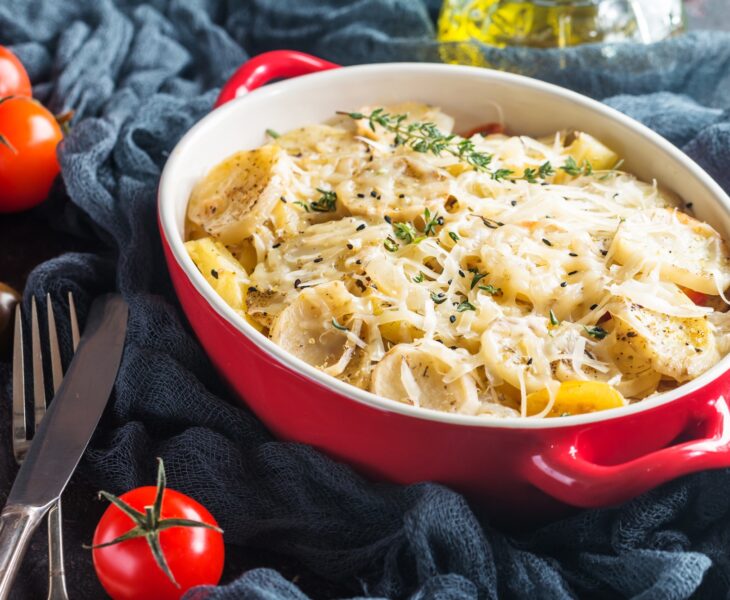 Potato gratin, in rustic dish.