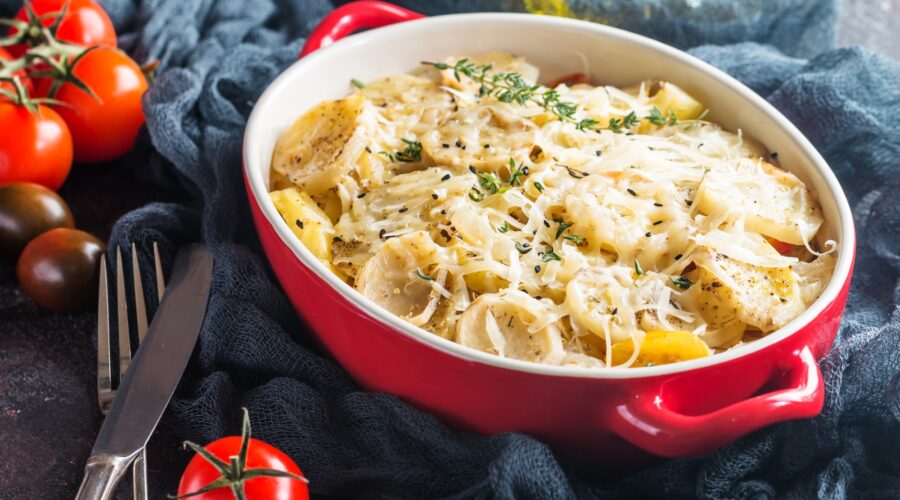 Potato gratin, in rustic dish.