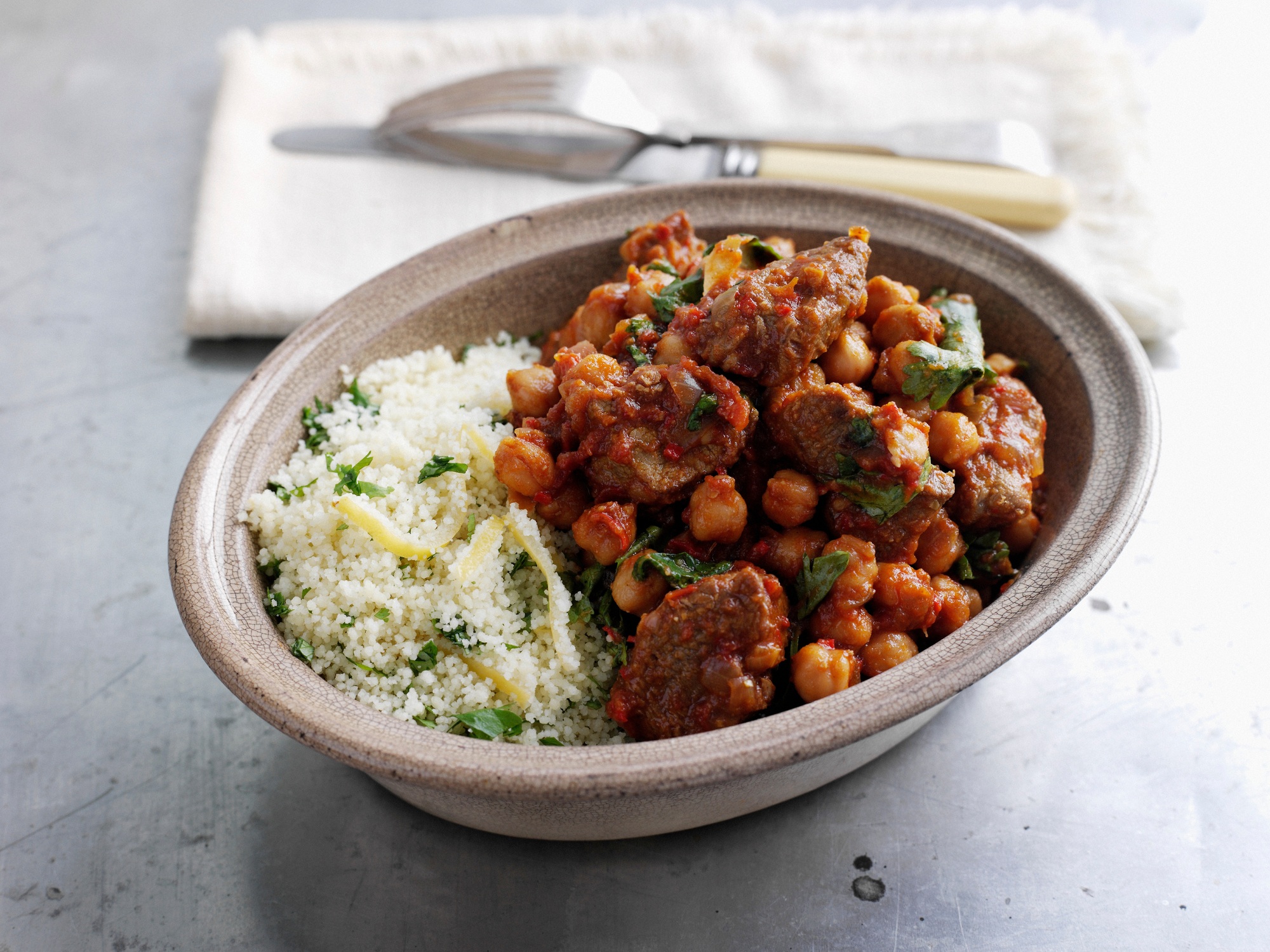 Bowl of couscous, meat and chick peas