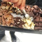 Chocolate Chocolatier giving away free samples of organic chocolate at a new local store