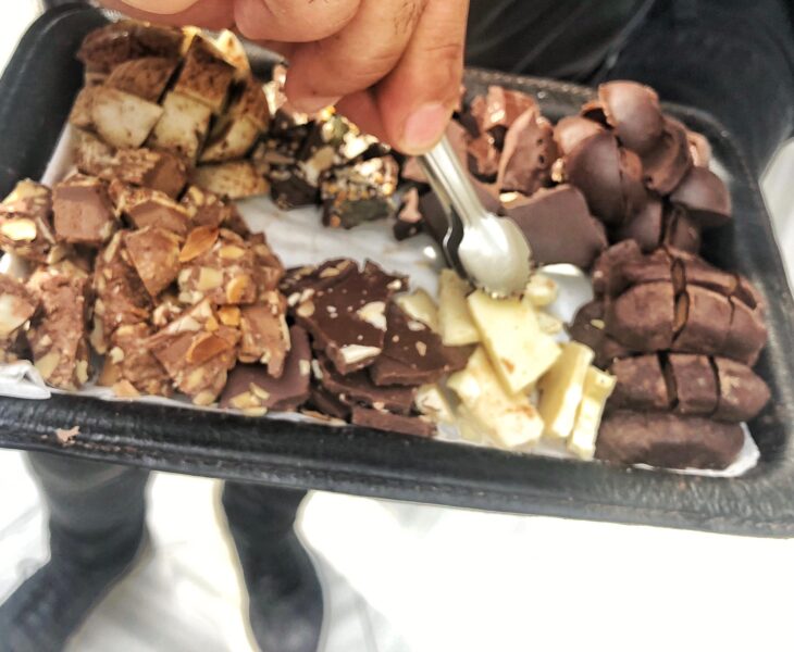 Chocolate Chocolatier giving away free samples of organic chocolate at a new local store