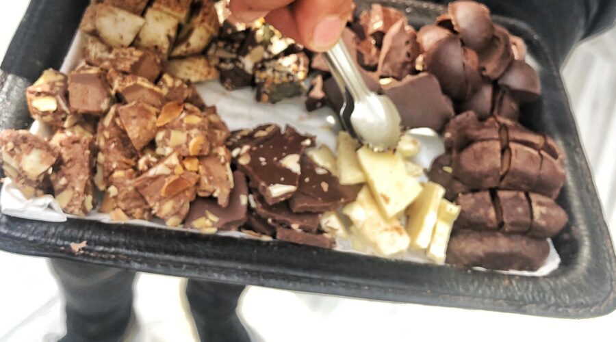 Chocolate Chocolatier giving away free samples of organic chocolate at a new local store