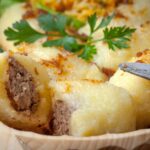 Potato dumplings stuffed with minced meat.