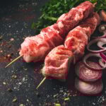 Raw pork meat , pickled kebab, with spices, top view, no people,