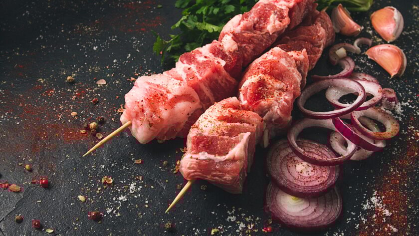 Raw pork meat , pickled kebab, with spices, top view, no people,