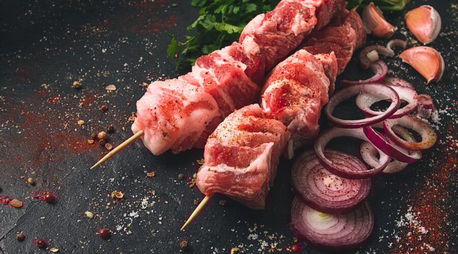 Raw pork meat , pickled kebab, with spices, top view, no people,