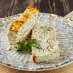 Salmon and dennis pate, sliced slices on plate of basil. French gourmet cuisine