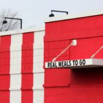 Sign: Real Meals To Go - takeaway, takeout, drive thru food service