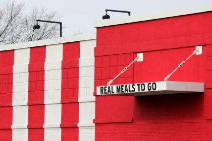 Sign: Real Meals To Go - takeaway, takeout, drive thru food service