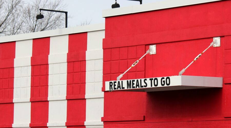 Sign: Real Meals To Go - takeaway, takeout, drive thru food service