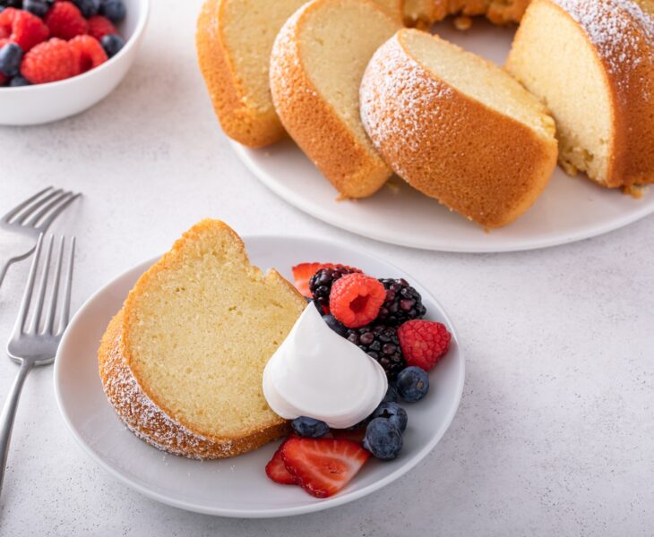 Sliced bundt pound cake with fresh berries