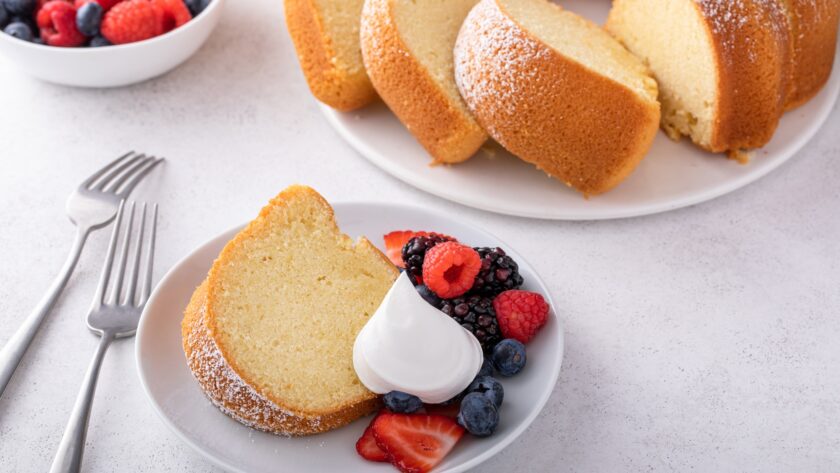 Sliced bundt pound cake with fresh berries