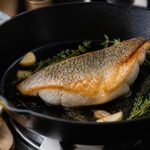 découvrez notre recette incontournable de black bass à la poêle pour une cuisson parfaite et un poisson tendre, sans risque de dessèchement.